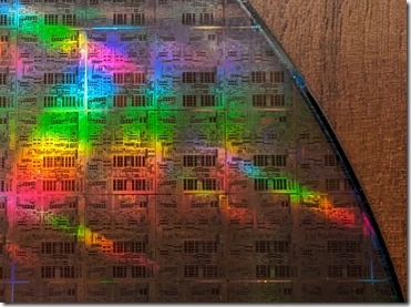 Rainbow-hued picture of the top-right corner of the CPU wafer